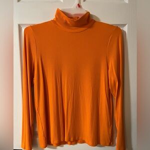 Reitmans women’s orange pull over shirt. Size XXL.